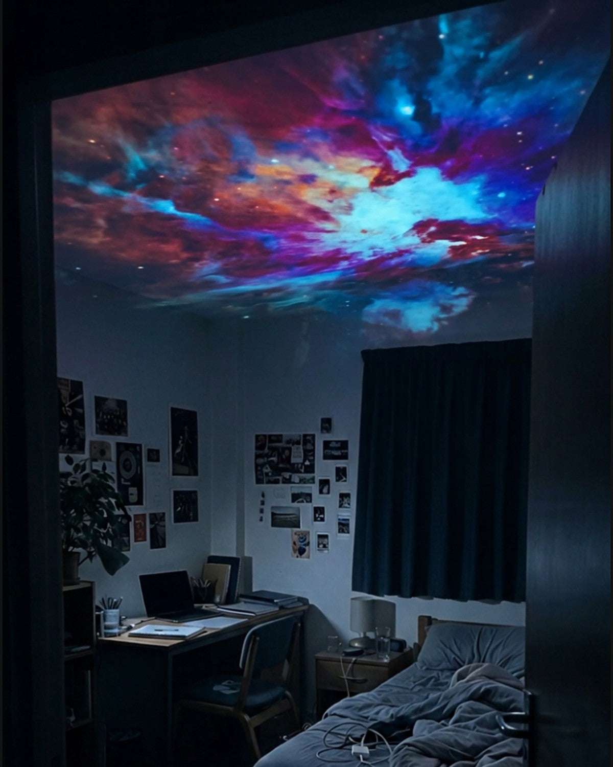 Colourful nebula projected on a bedroom ceiling by the Lunora projector