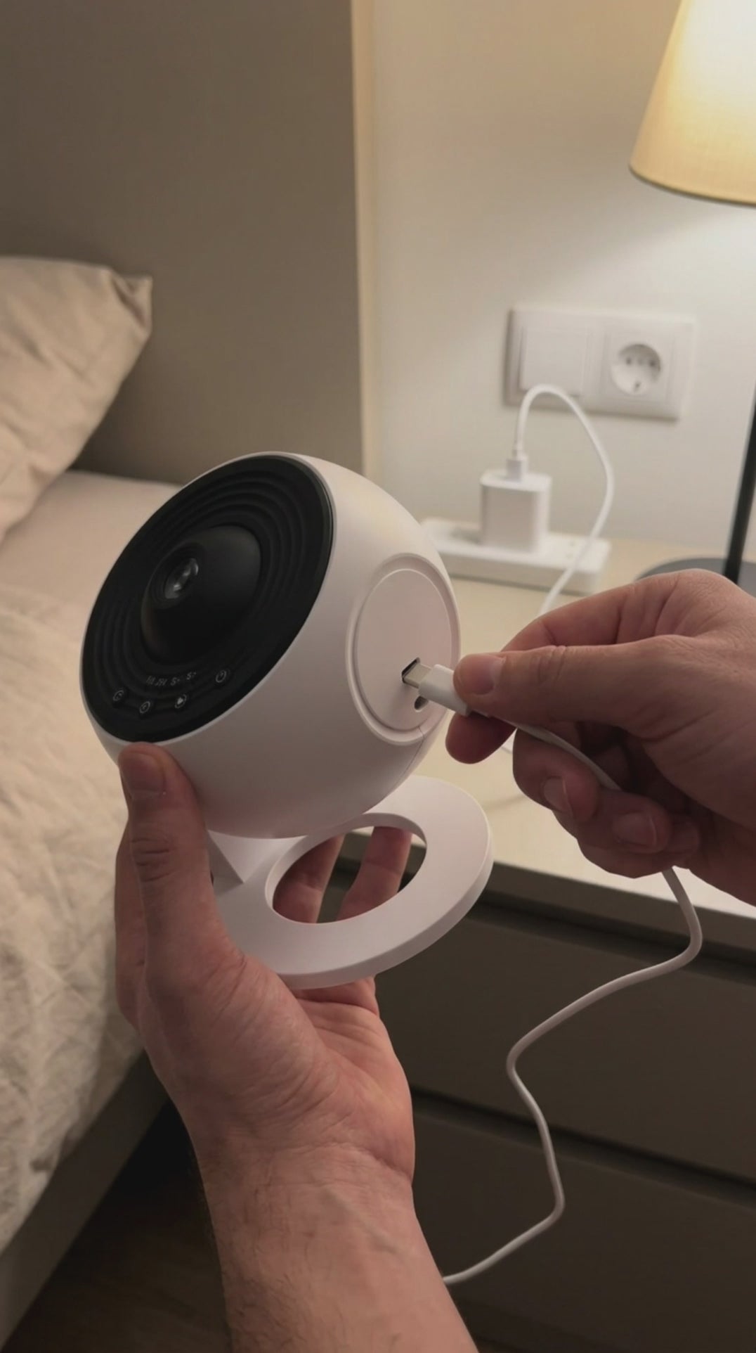 Plugging in the Lunora projector with USB-C